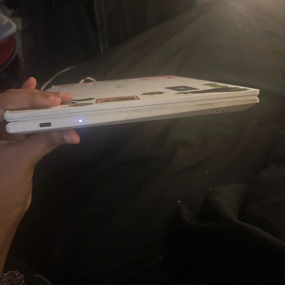 ASUS White Laptop with Leopard Print Display